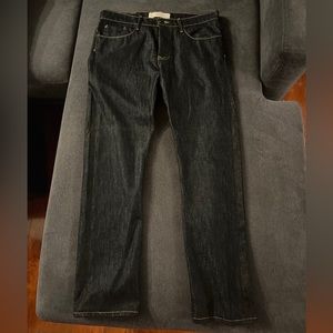 THVM tapered fit Raw denim jeans